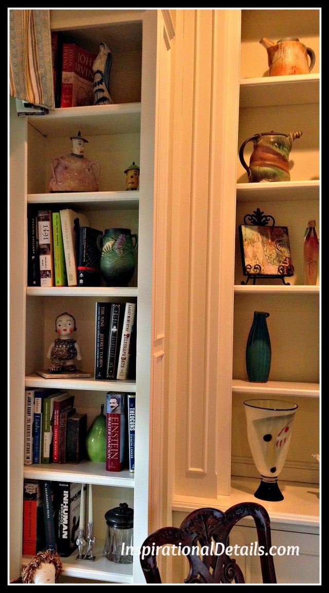 bookcases with art and books